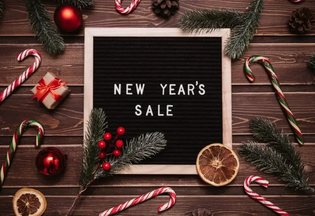 The inscription New Year's sale on the message board. Top view.